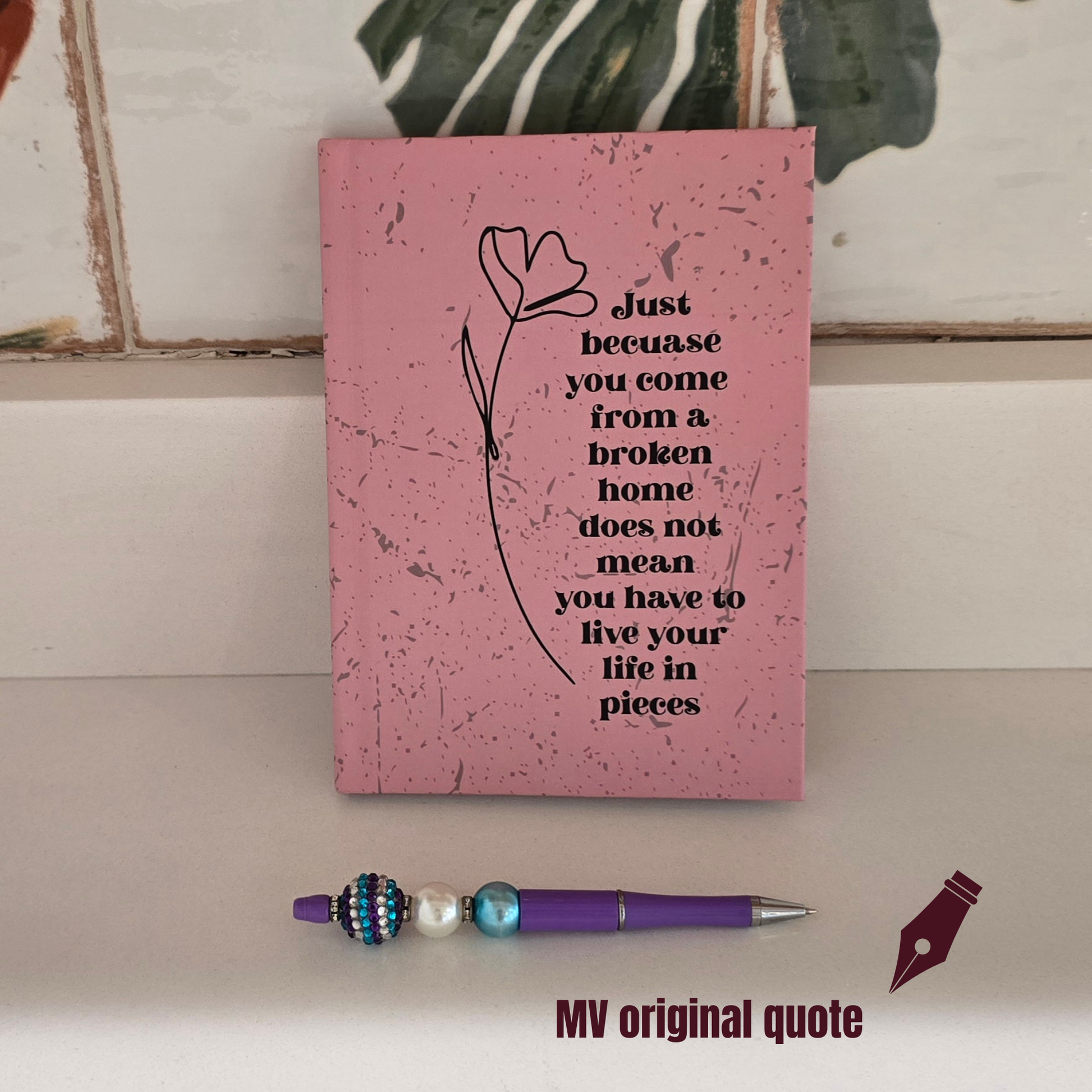 "Pieces of Comfort" inspirational faith journal with quote about healing from a broken home and trusting God on dusty pink cover quote on front .by motivated vision