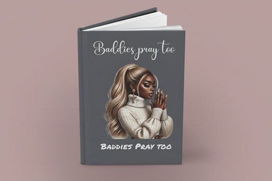 Book with a cover featuring an illustration of a woman praying and text 'Baddies pray too' on a beige background.by motivated vision